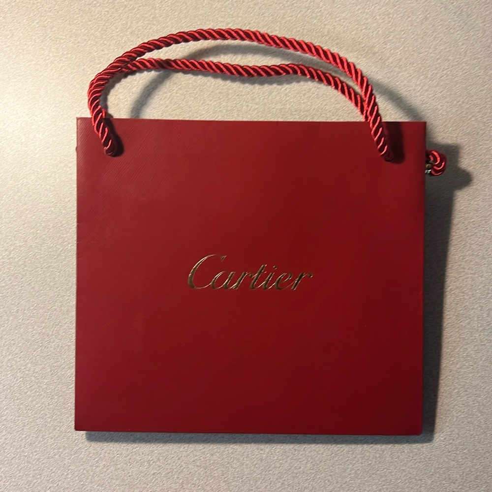 Cartier Small Shopping Bag. Some minor signs of wear on back of bag